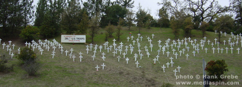Wide shot of Lafayette hillside of crosses Iraq memorial